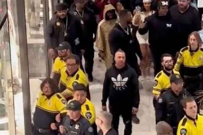 Floyd Mayweather goes shopping with huge entourage and wall of ‘30 security guards’