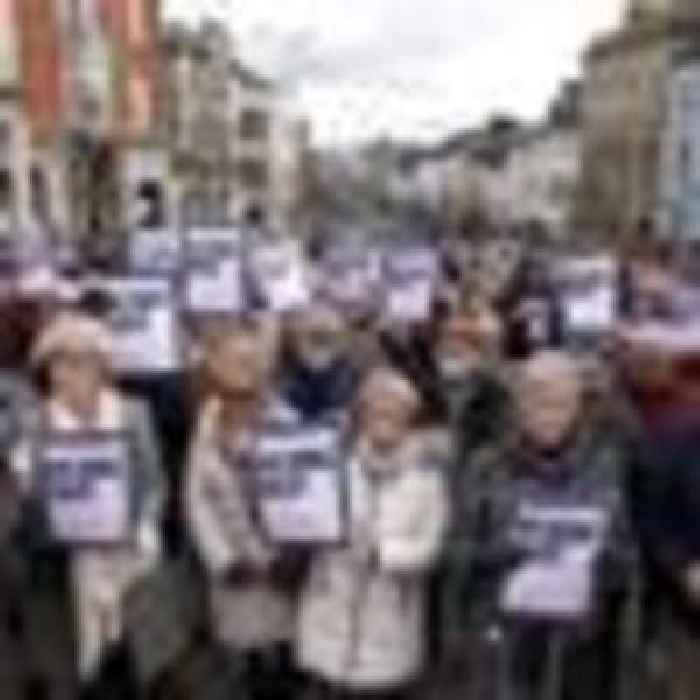 Crowds rally against parliamentary violence after detective shot in Northern Ireland
