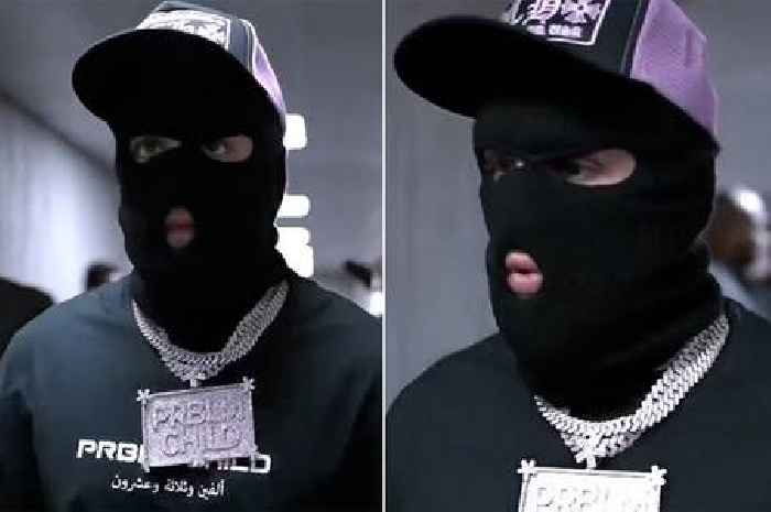 Jake Paul wears balaclava at Tommy Fury fight as fans say he's busy 'robbing viewers'