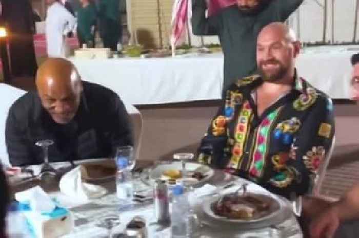Mike Tyson and Tyson Fury enjoy dinner together before doing a sword dance