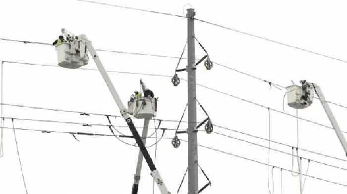Michigan power line work continues, California gets breather