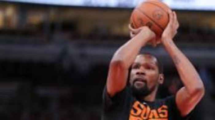 Durant misses Suns home debut after warm-up injury
