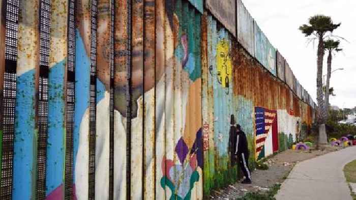 Group protests 30-foot border walls ahead of Biden's San Diego visit