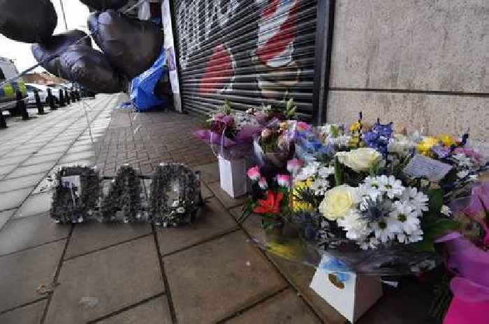 Emotional tributes to Shard End murder victim Darren Smith as flowers spelling 'dad' left at scene