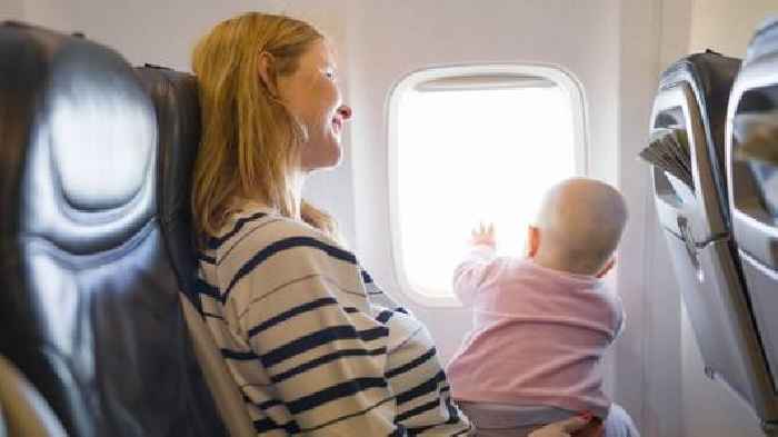 Flight attendants call to end infants sitting on parents' lap