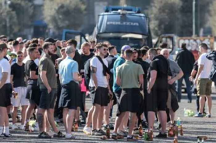 Black-eyed and bloodied England fan among boozy Barmy Army out in notorious Naples