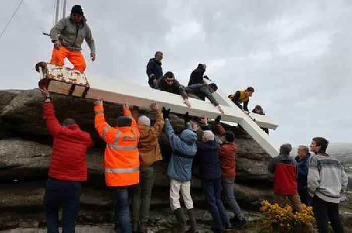 Giant cross raised on 700ft high rocky outcrop for Easter