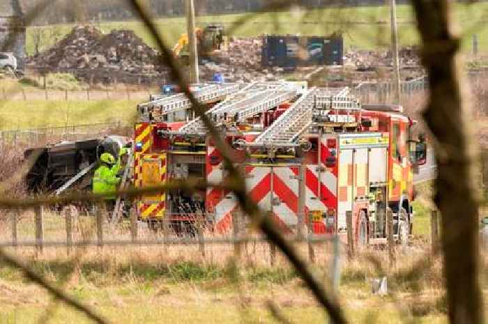 Car flips onto side in horror crash near Ayr Hospital as emergency services race to scene