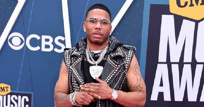 Rapper Nelly Acts As Bartender At Florida Event While Passing Out MoShine — Watch