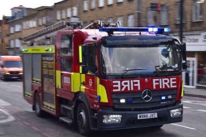 Man arrested on suspicion of murder after person dies in fire in block of flats