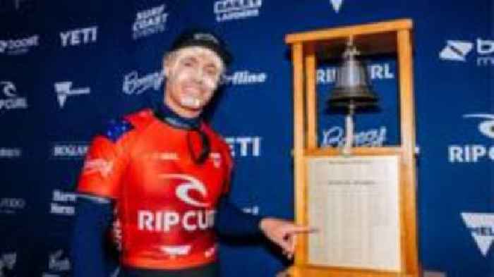 Ewing wins surf title to match late mother's success