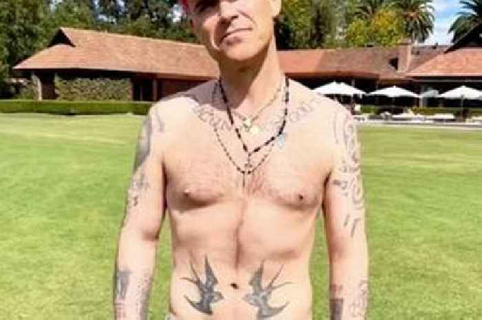 Robbie Williams unrecognisable with new physique after staggering weight loss