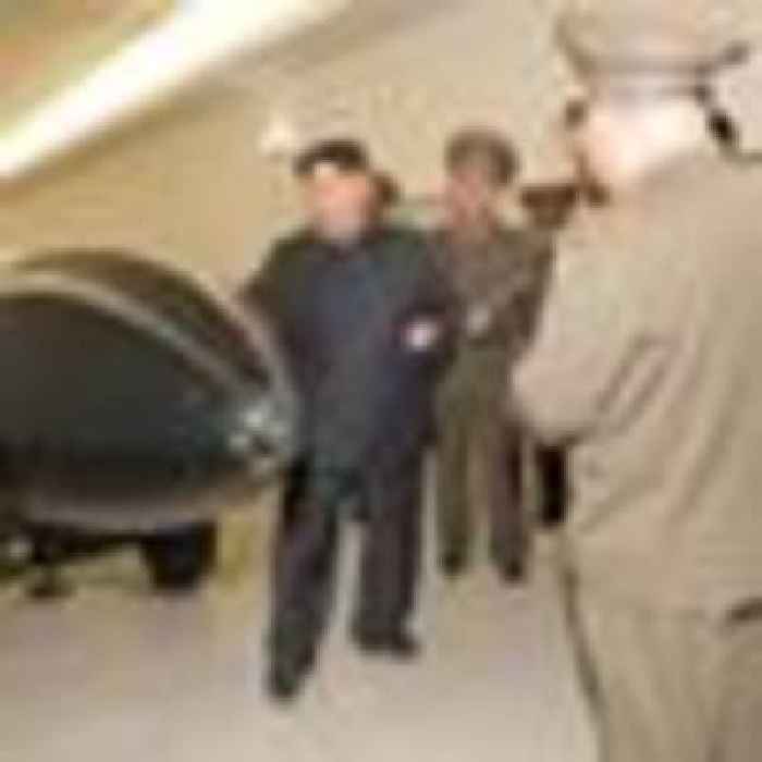 Kim Jong Un 'guides' test of new missile - as launch sparks panic in Japan