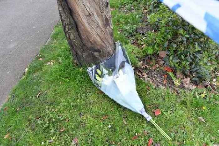 Flowers left at Solihull murder probe scene after man stabbed to death