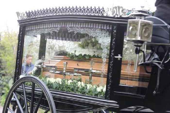 Paul O’Grady’s coffin decorated with wreath of dog Buster at funeral