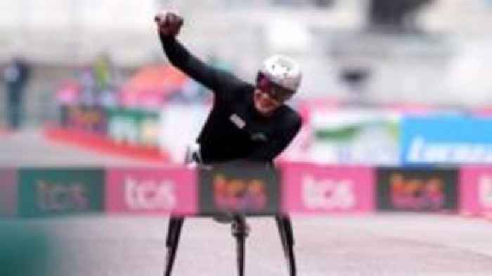Hug wins wheelchair race in London Marathon record