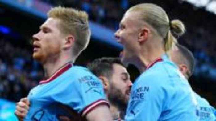 Man City hammer Arsenal to move two points off top