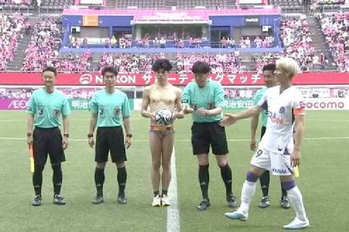 Man walks onto pitch with teams wearing only skimpy pants and even referees look confused