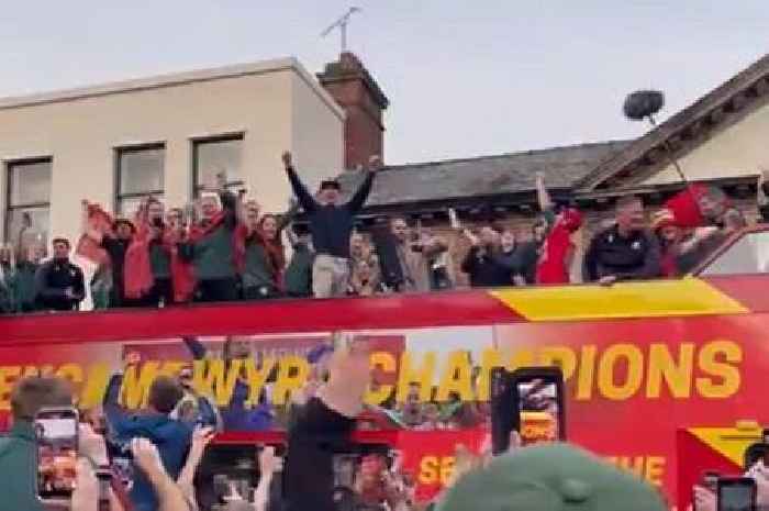 The moment Ryan Reynolds and Rob McElhenney belt out the Welsh national anthem on Wrexham victory parade