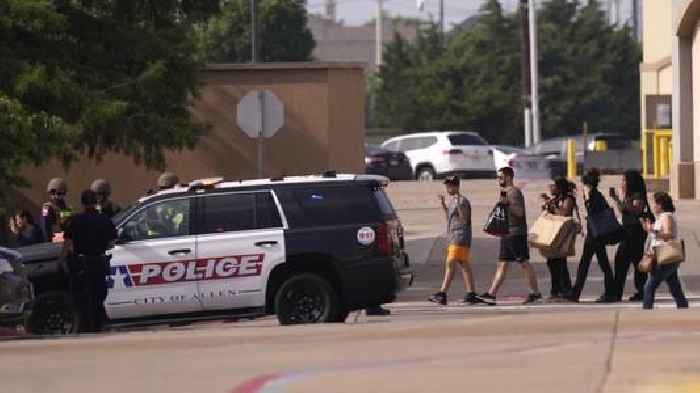 Police respond to an active shooter situation at a Texas outlet mall