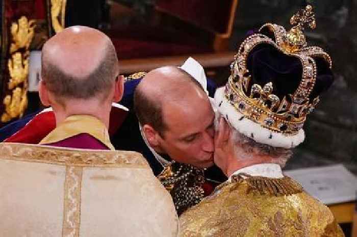 Touching moment between William and Charles as Harry 'cranes neck to watch'