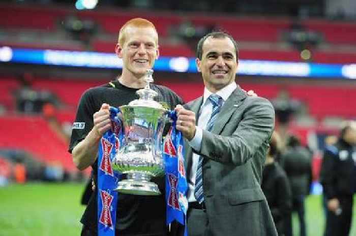 Wigan's FA Cup heroes celebrated with Irn Bru after being handed medals in a bag