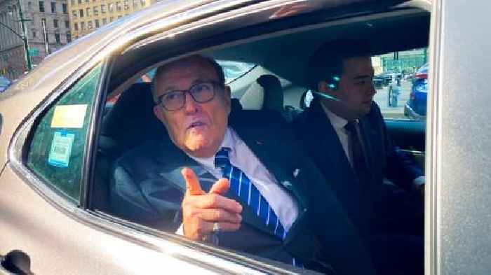 Woman sues Rudy Giuliani, alleging he sexually coerced her on the job