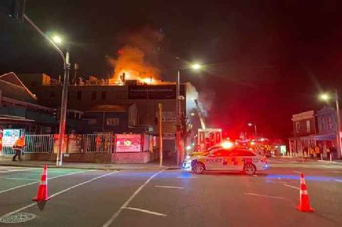 New Zealand hostel fire leaves 'six dead and 20 missing' as flames tear through building