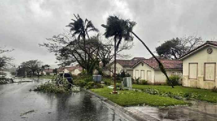 Typhoon warnings dropped for Guam as Mawar drifts away