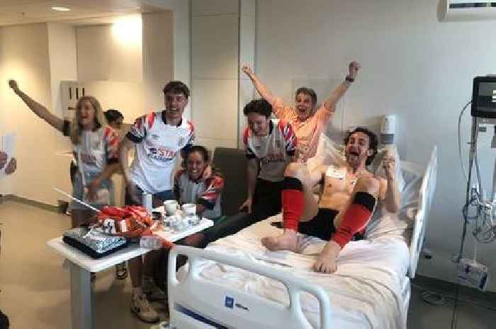 Luton star Tom Lockyer celebrates promotion from hospital bed after collapsing on pitch