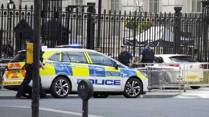 Man who hit UK prime minister's gate arrested over indecent images
