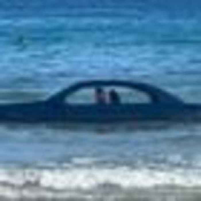 BMW washes out to sea