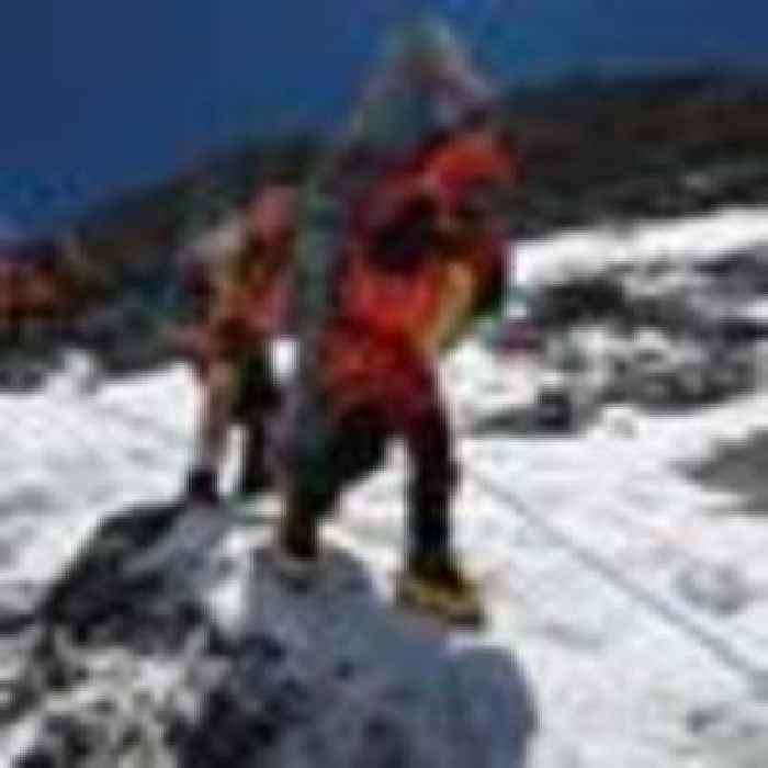 Sherpa guides rescue freezing climber from Everest 'death zone' in 'almost impossible' mission