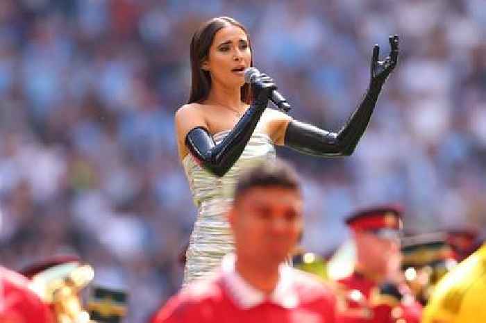 FA Cup viewers bemused by national anthem singer's 'BDSM costume' before City vs United