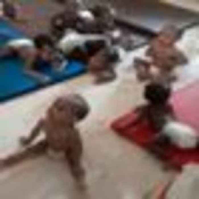 Hundreds of trapped children saved from orphanage after 71 died