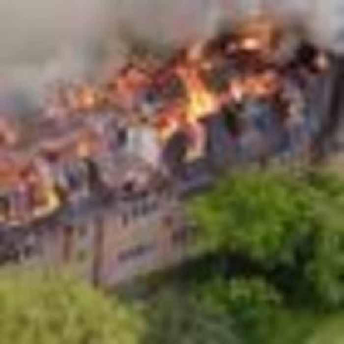 Man arrested after huge fire destroys part of listed building