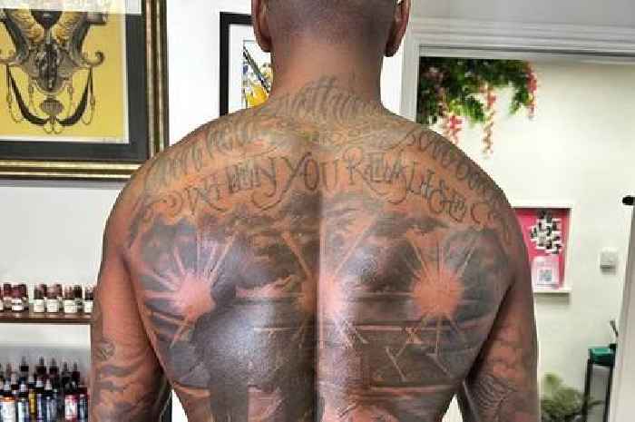 Ex-Man Utd star Ashley Young shows off incredible football-inspired back tattoo