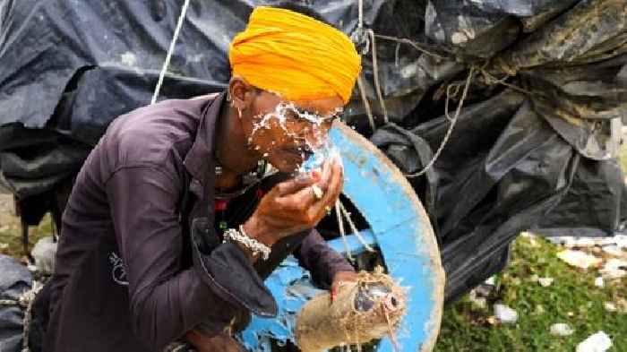 Nearly 100 die as India struggles with sweltering heatwave