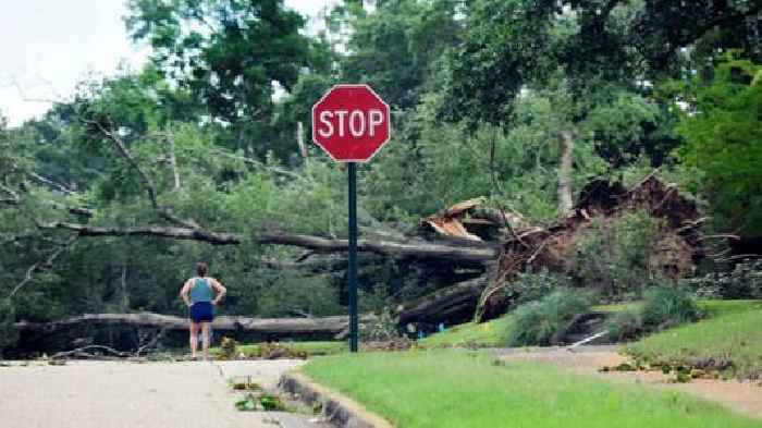 Thousands without power after heat wave triggers storms in US