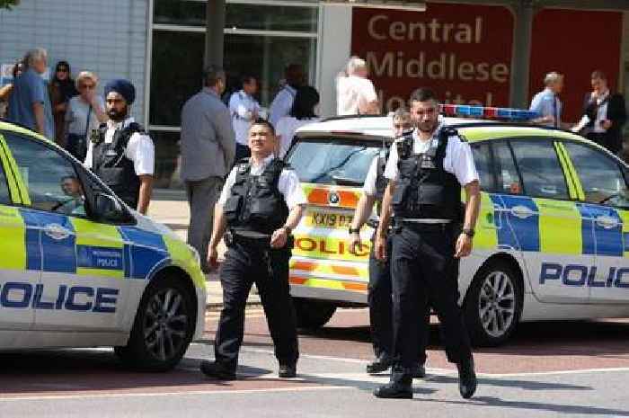 Armed police arrest man as two stabbed at hospital in horror attack