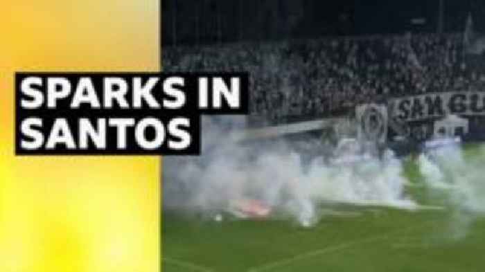 Chaos as fans throw rockets onto pitch in Brazil