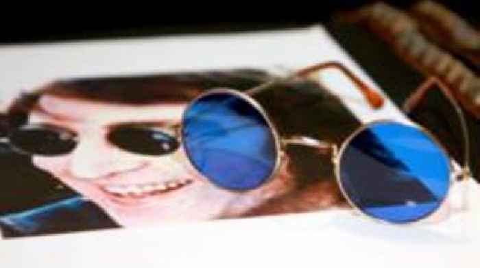 Auction for John Lennon glasses and Abbey Road photos