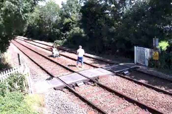 Trespassers risk death posing for pictures and lying on tracks in shocking railway CCTV