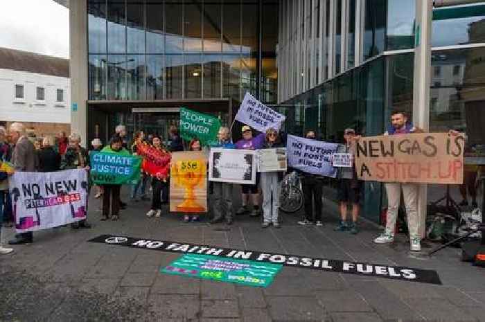 Climate activists protest against fossil fuel plant plans in Perth city centre