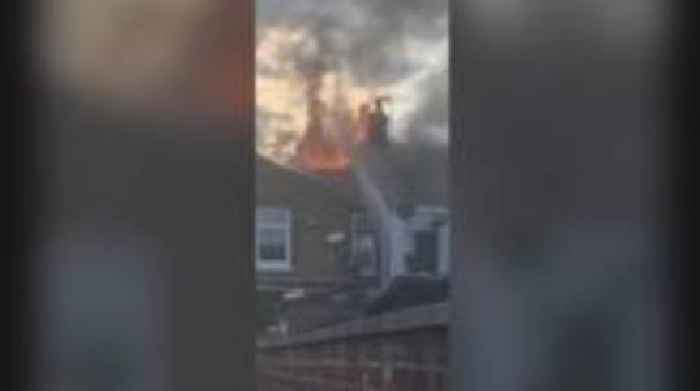 Video captures blaze damaging three homes