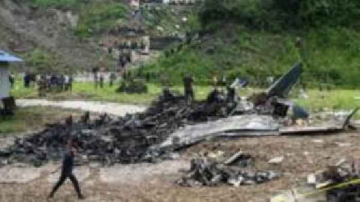 Watch: Emergency workers pick through wreckage of Nepal plane crash