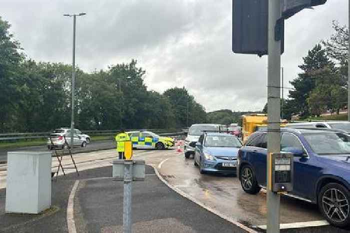 Biker rushed to hospital after crash with car near Asda in Torquay