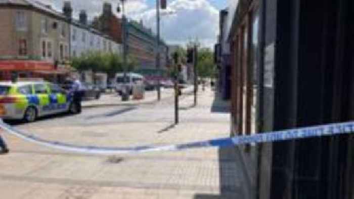 City centre road closed after man stabbed