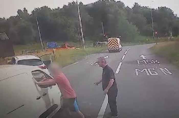 Road rage incident explodes into violence as driver rams van off road before pair brawl on roundabout
