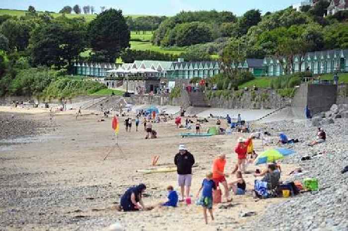 Beachgoers enjoy the warm weather in Langland and Bracelet Bay